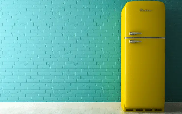 yellow fridge bluish wall