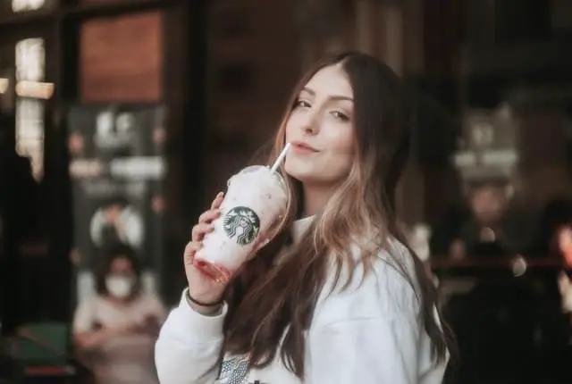 girl holding frappuccino